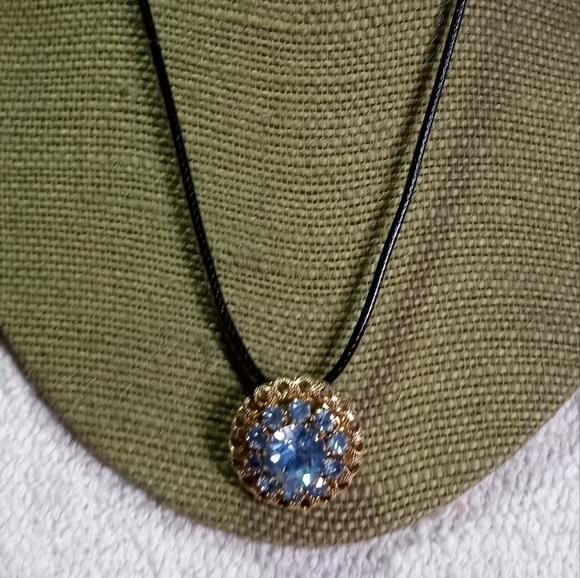 Goldtone blue crystal pendant on black cord necklace - Picture 1 of 5